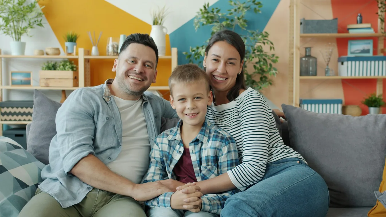 A family sitting together at home